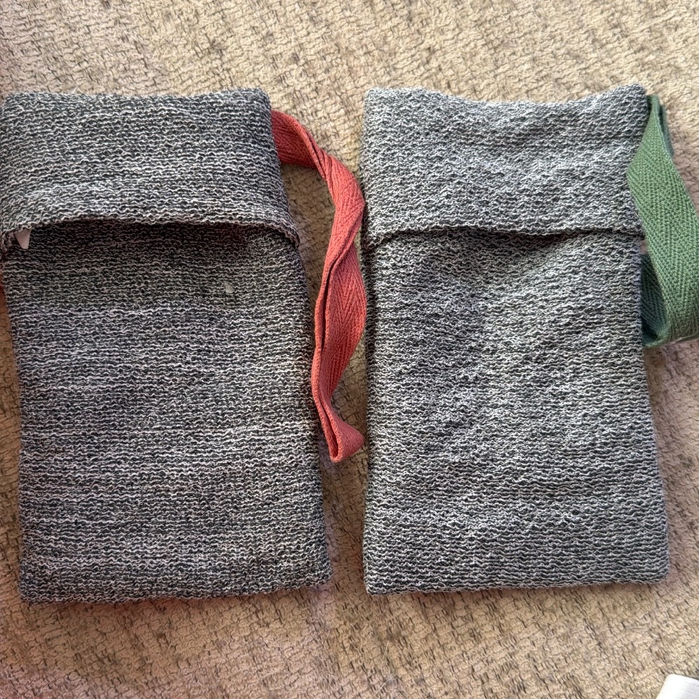 Two exfoliating soap scrubs - sponges that hold the soap inside